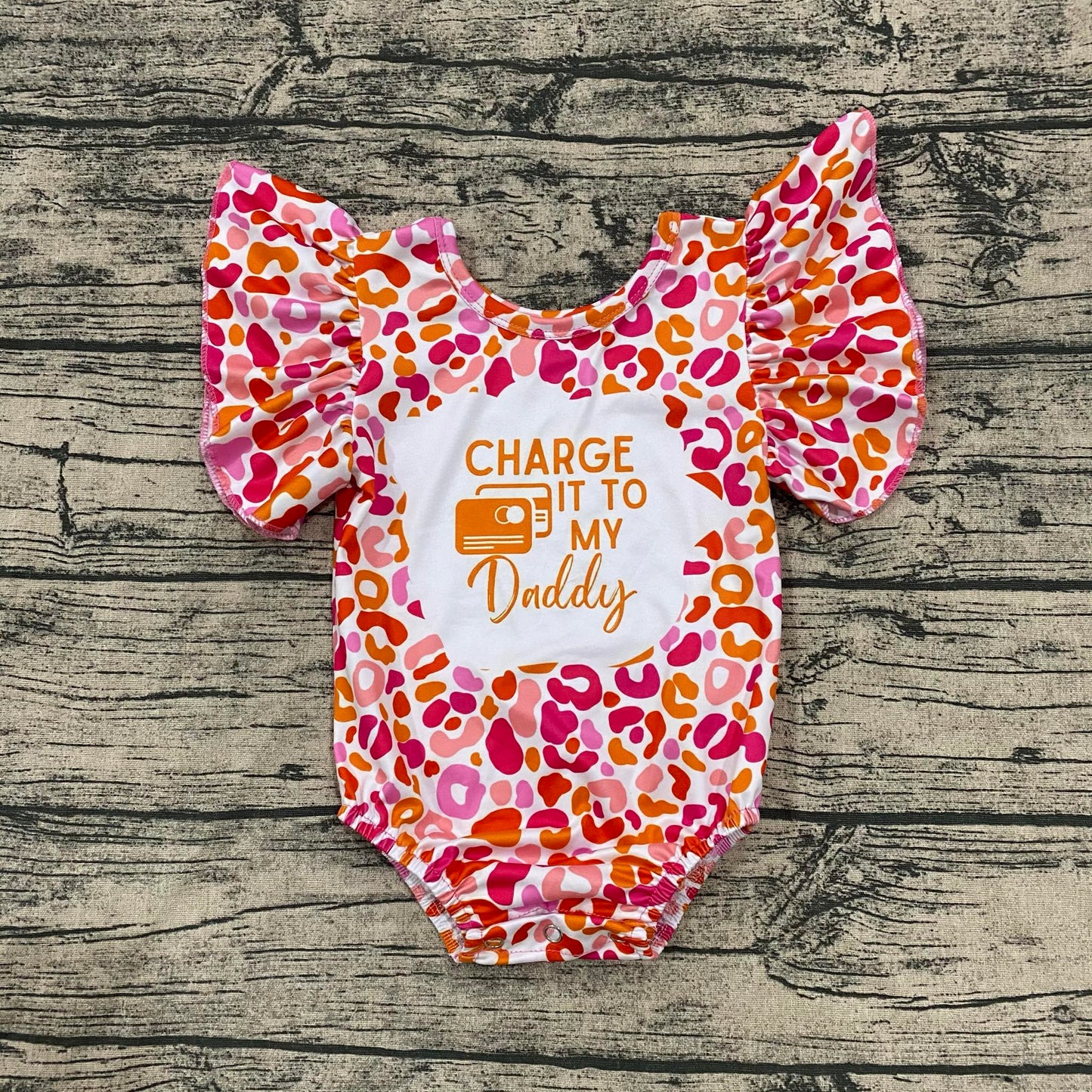 Charge it to my daddy orange and pink Leo