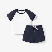 2-piece Toddler Boy Waffle Colorblock Raglan Sleeve Tee and Solid Color Shorts Set