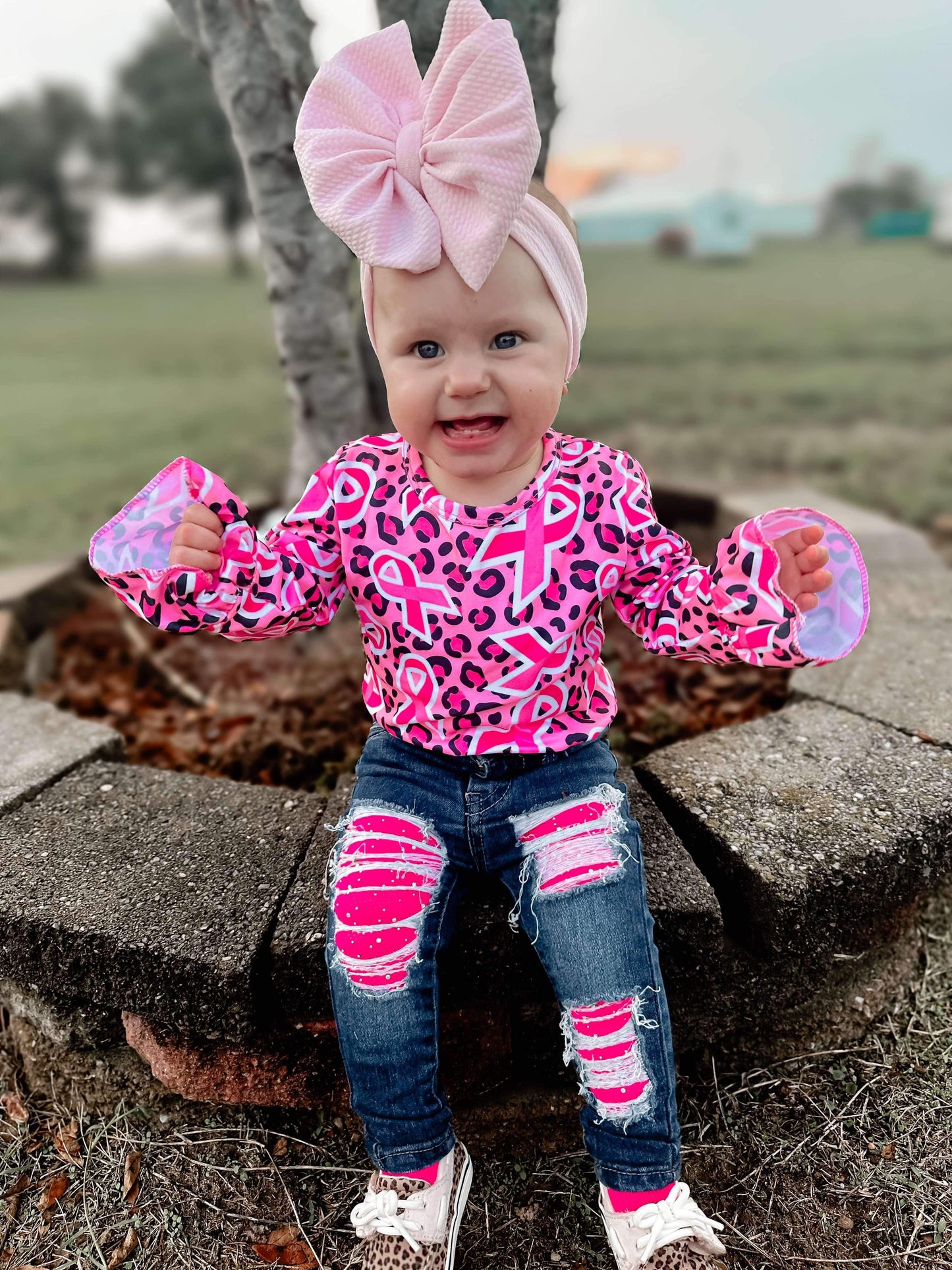 We wear pink sleeve bell leo only