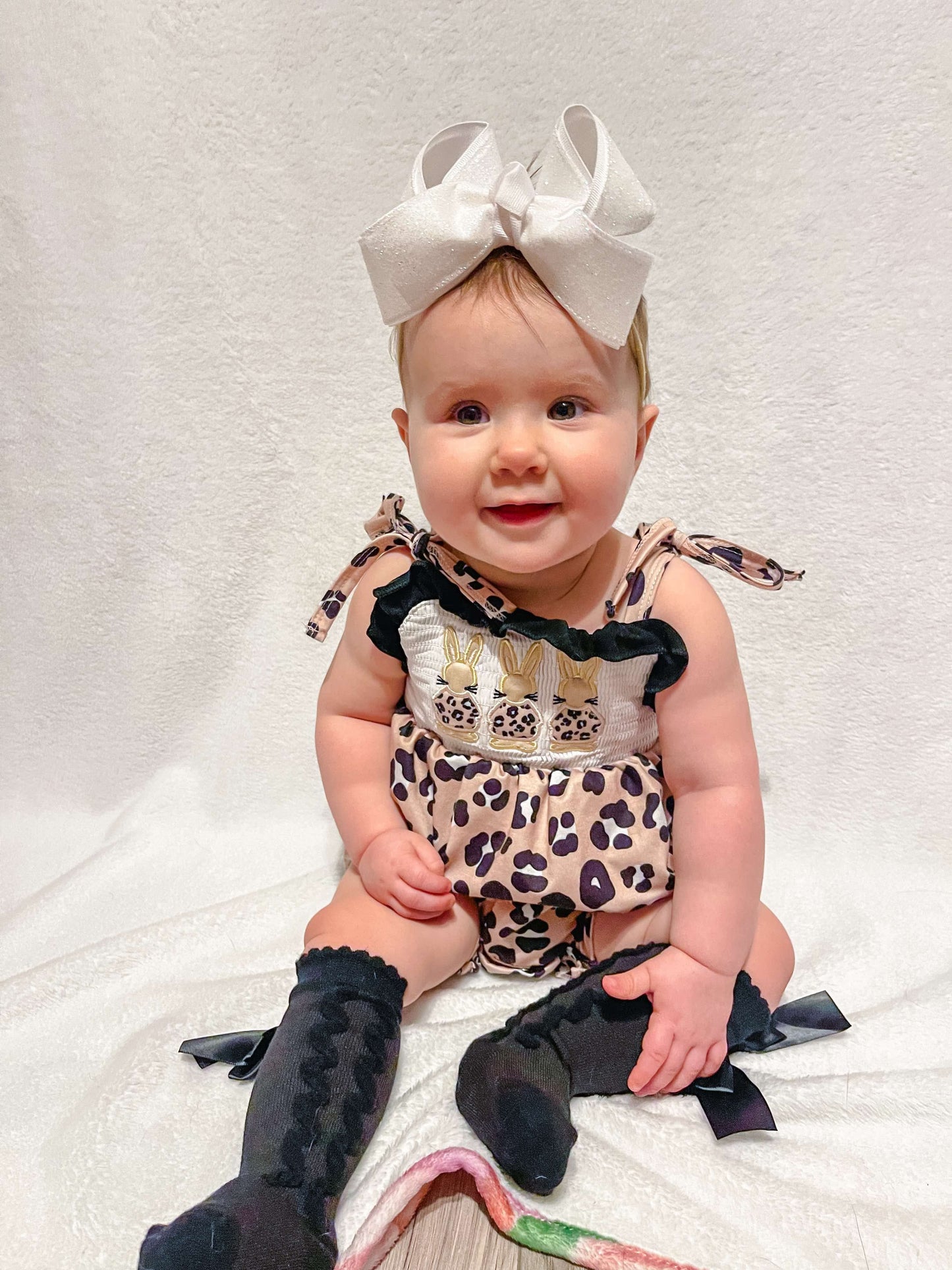 Smocked leopard bunny tie romper
