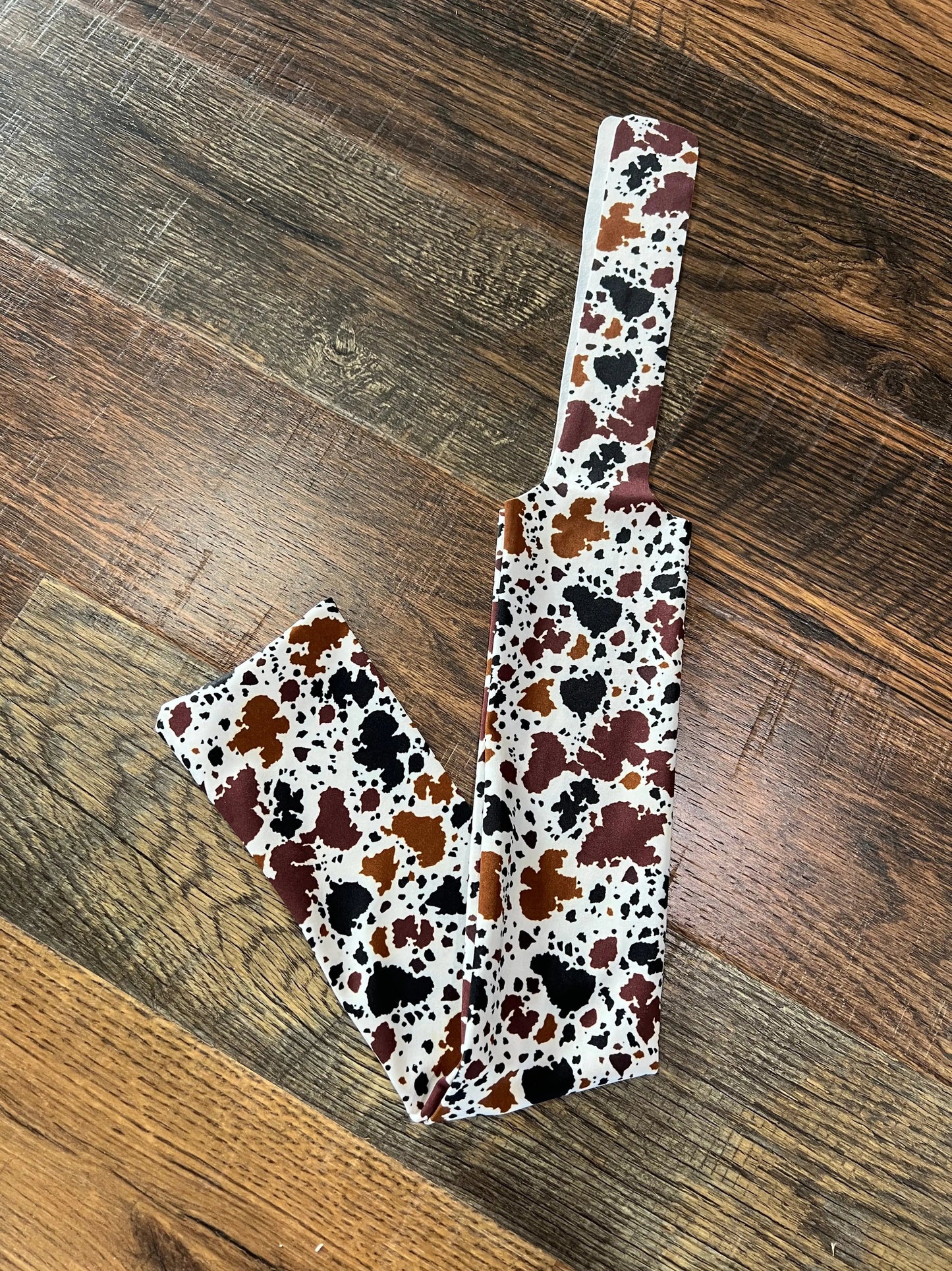 Cowprint Lycra printed slip on tail bag