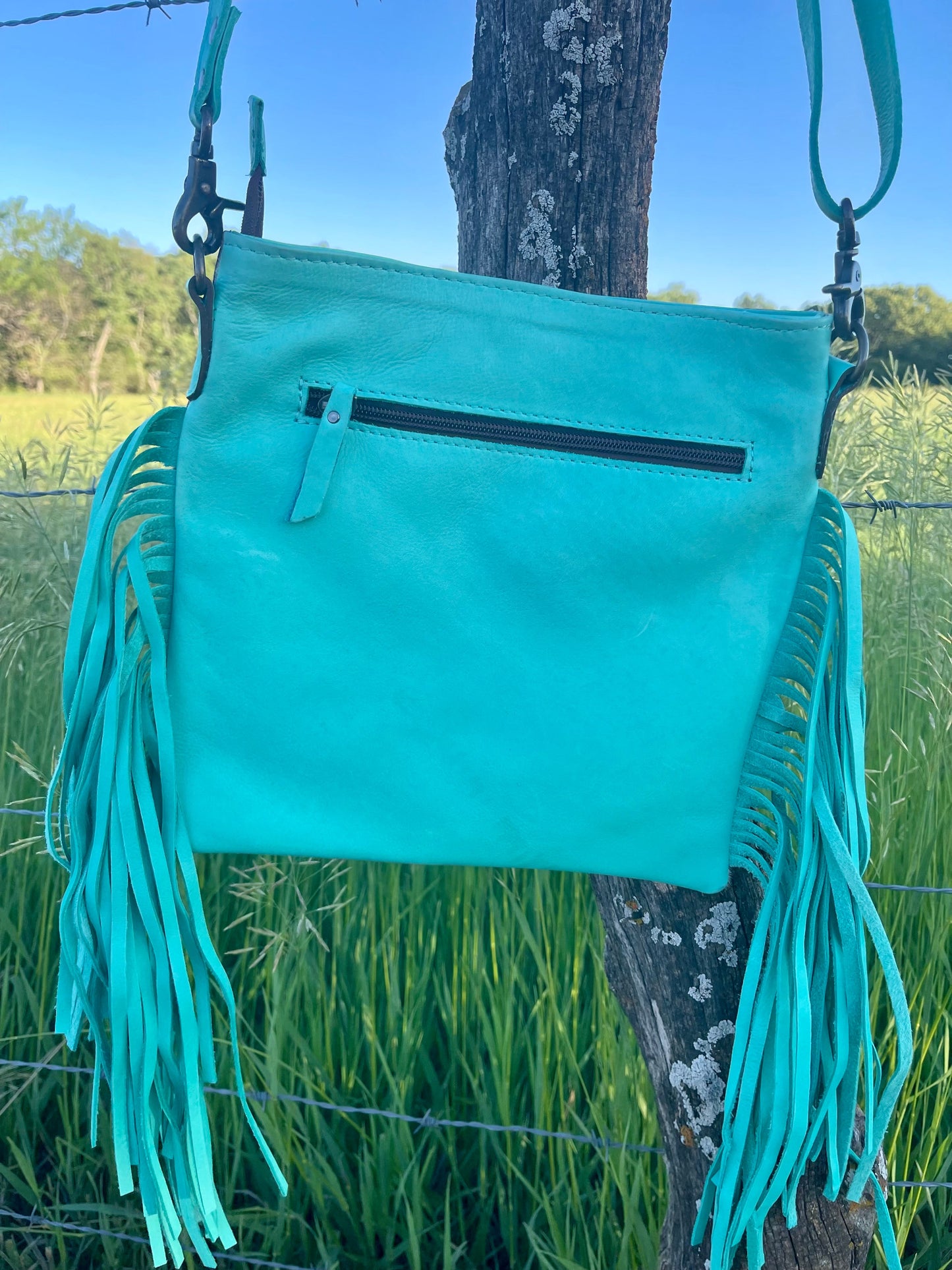 Turquoise Fringe Tooled Hide Crossbody