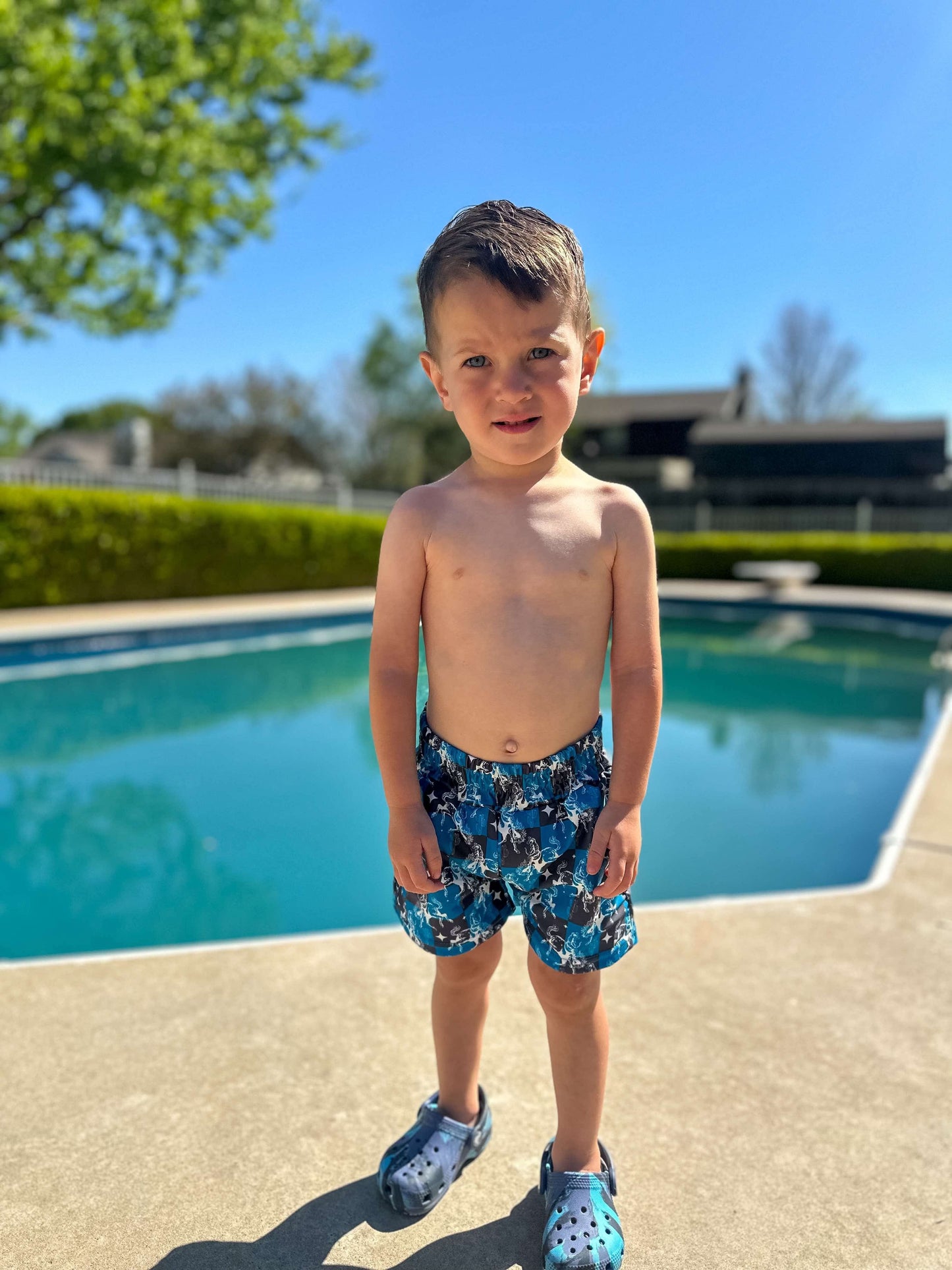 Teal Buckin’ Broncs Swim Trunks