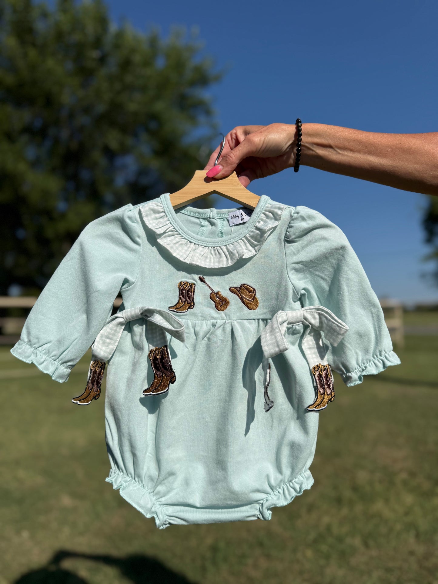 Boot scootin' Cutie smocked romper