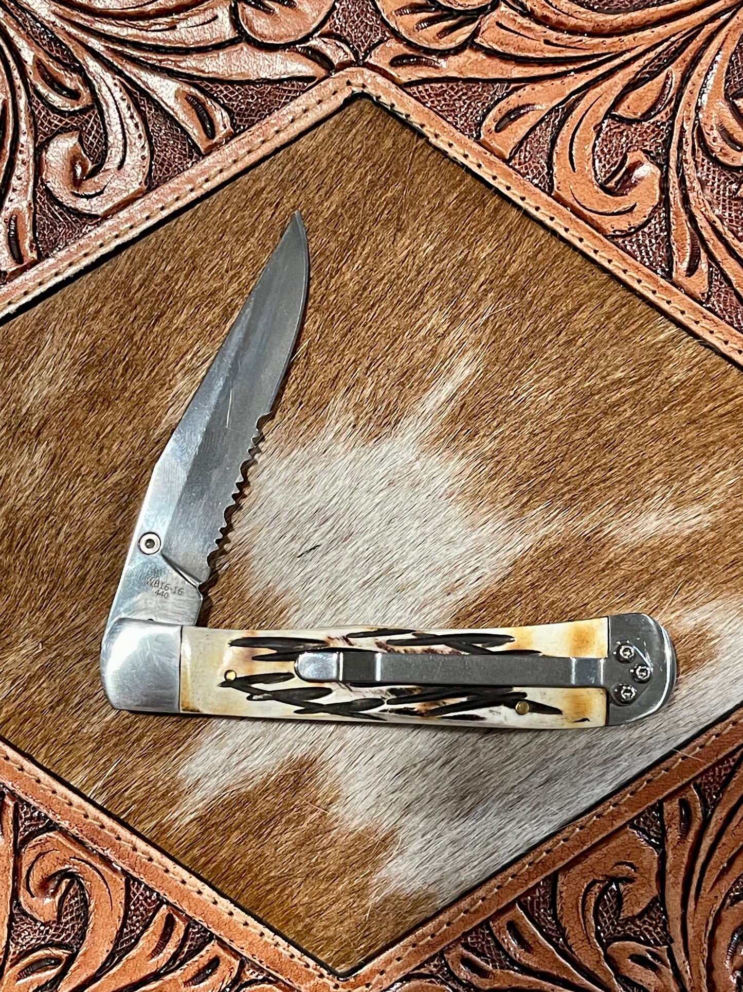 Carved Burnt Bone Locking Trapper