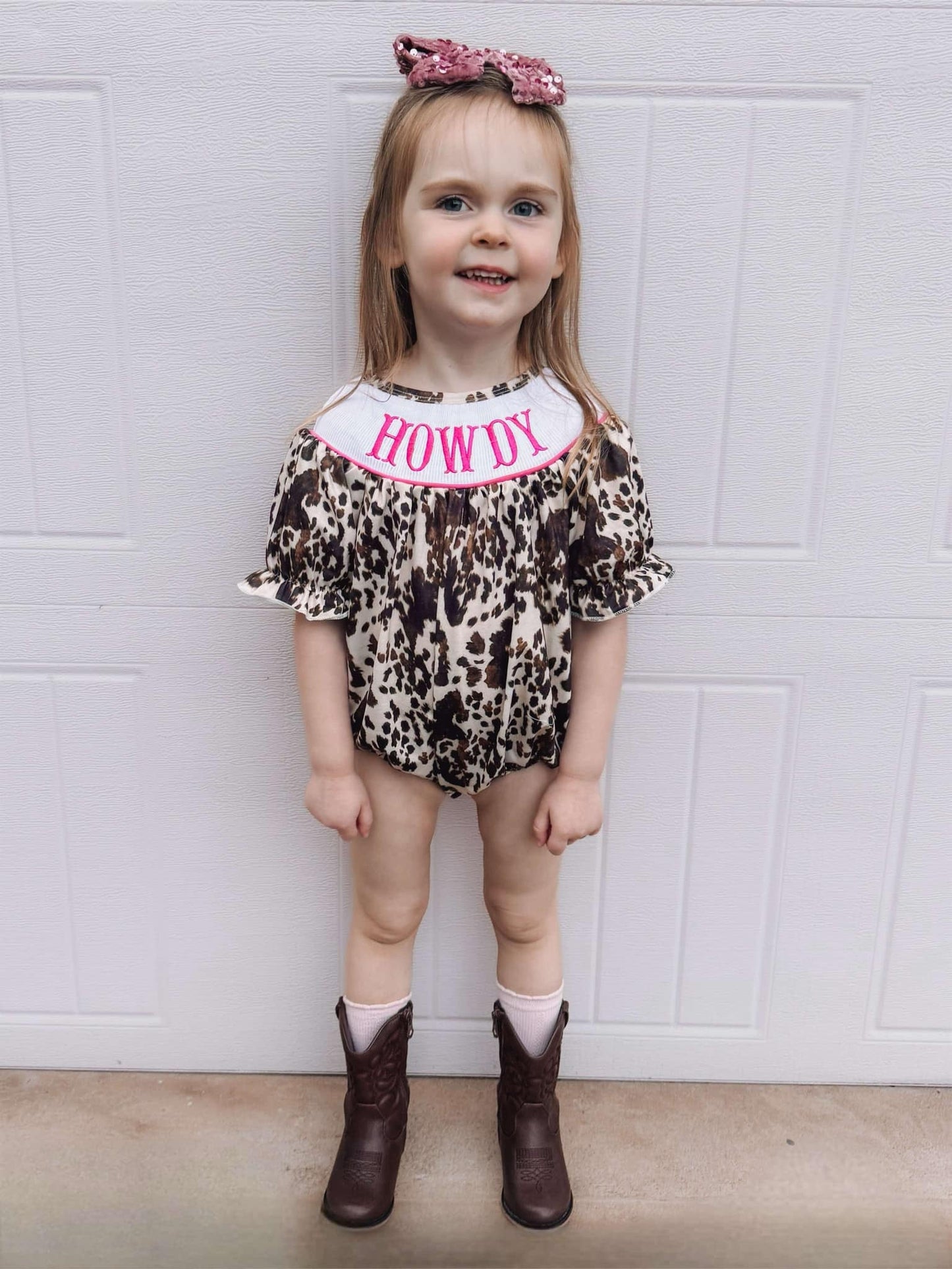 Smocked cowhide howdy romper