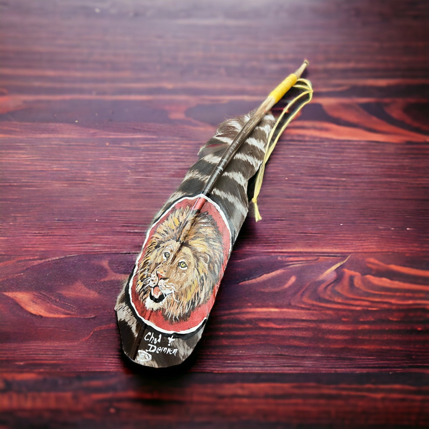 Painted hat feather by Chad Demien - Lion