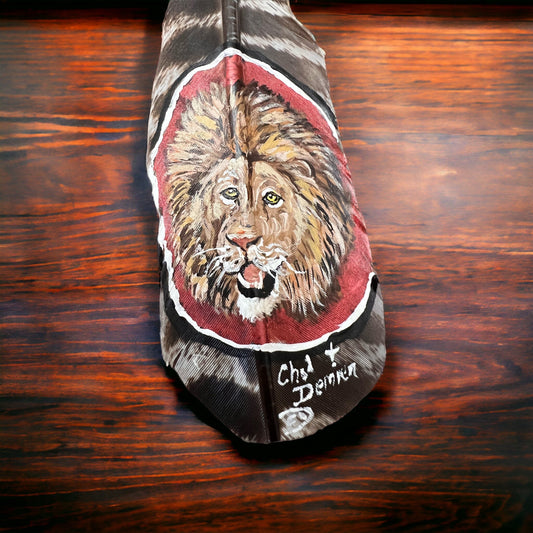Painted hat feather by Chad Demien - Lion